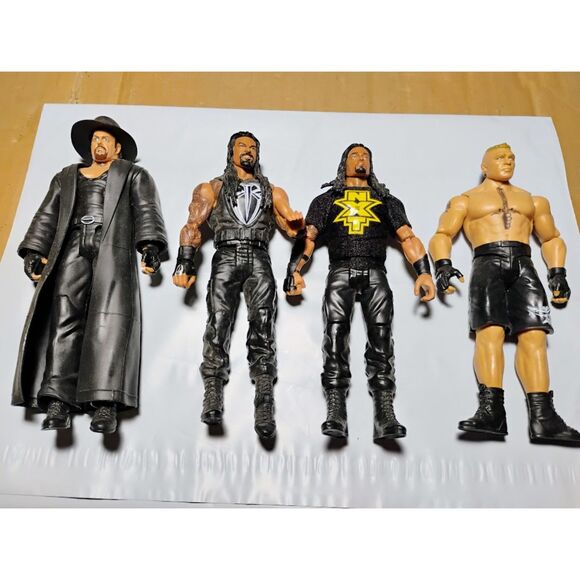 Lot of 4 WWF/WWE Wrestling Figures Roman Reigns Brock Lesnar Undertaker & More - Picture 2 of 12